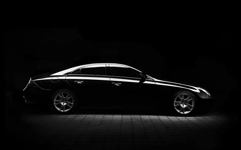 Černé BMW vozidlo pozadí